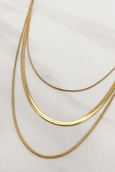 Three Strand Gold or Silver Plated Snake Chain Necklace Trendy Gold Snake Chain Layered Necklace, Trendy Gold Multi-strand Necklace, Chic Gold Layered Snake Chain Necklace, Modern Double Strand Gold Chain Necklace, Minimalist Multi-strand Gold Layered Necklace, Minimalist Gold Multi-strand Layered Necklace, Modern Gold Layered Necklace With Delicate Chain, Trendy Gold Layered Jewelry, Trendy Layered Gold Jewelry