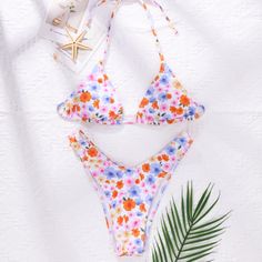 Description:Style:BohoColor:MulticolorPattern Type:Floral, TropicalNeckline:V neckBra Type:Wireless BraBottom Type:NaturalBody:LinedChest pad:Removable PaddingMaterial:PolyesterComposition:82% Polyester, 18% SpandexFabric:High Stretch Summer Printed Halter Neck Swimwear, Tropical Print Swimwear For Vacation Festival, Printed Swimwear For Beach Season Festivals, Printed Swimwear For Festival During Beach Season, Beach Season Floral Print Swimwear, Summer Festival Printed Swimwear, Floral Print Halter Neck Swimwear For Summer, Halter Neck Tropical Print Swimwear For Summer, Multicolor Halter Neck Swimwear For Summer