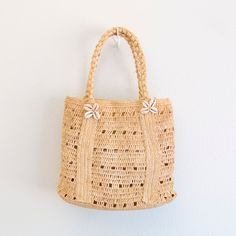 IN STOCK FAST SHIPPING FROM LOS ANGELES Add some coastal charm to your summer look with Elena Handbags Raffia Beach Bag. This shoulder bag is made from natural raffia, complete with a playful shell decoration. Perfect for a day at the beach or a casual outing, it's the must-have accessory for any summer adventure! Natural Soft Raffia Straw Handmade Size: 11"H x 13"W x 6"D Strap drop length: 7" Designer Style ID: 8706 Natural Color Pouch Shoulder Bag For Vacation, Natural Pouch Shoulder Bag For Vacation, Natural Color Beach Satchel Bag, Natural Color Beach Bag Satchel, Summer Crochet Travel Bag With Removable Pouch, Natural Beach Bag With Removable Pouch For Spring, Natural Color Bags With Removable Pouch For Vacation, Eco-friendly Beach Shoulder Bag With Removable Pouch, Spring Beach Bag With Removable Pouch In Natural Color