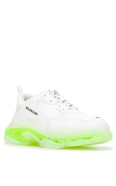 Balenciaga's white Triple S trainers are an avant-garde reworking of one of the label's cult styles. They're crafted from mesh and leather panels with an embroidered logo at the side, then set on a chunky fluorescent rubber sole.White/neon yellow Logo print to the sideRound toeFront lace-up fasteningPull-tab at the heel Chunky rubber soleComposition: Leather, mesh and leather panelsSole: Rubber 100%Lining: Fabric 100% Neon Yellow Balenciaga Sneakers, High-top Mesh Sneakers With Logo Print, White Custom Sneakers With Translucent Outsole In Mesh, Custom White Mesh Sneakers With Translucent Outsole, Streetwear Custom Mesh Sneakers With Perforations, Designer Custom White Sneakers With Translucent Outsole, Designer White Mesh Sneakers, White Designer Mesh Sneakers, Chevron Outfit