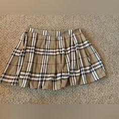 Brown Plaid Rue 21 Stretch Skirt. Fits True To Size Nwot Casual Brown Tennis Skirt For Summer, Casual Brown Summer Tennis Skirt, Casual Beige Pleated Skirt, Beige Lined Casual Pleated Skirt, Casual Brown Pleated Skort, Casual Beige Pleated Mini Skirt, Casual Brown Pleated Skirt For Summer, Casual Beige Lined Pleated Skirt, Beige Lined Pleated Skirt Casual Style