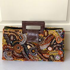 A Laura Lee’s Signature Handbag. Unique Bag Has Approximately 20,000 Beads, Measures 15x8x4, And Has An Interior Zipper To Secure Your Valuables. Brand New - Never Used! Handmade Multicolor Formal Bags, Brown Clutch Box Bag For Shopping, Designer Rectangular Clutch With Handles, Luxury Multicolor Handheld Clutch, Multicolor Clutch Bag With Handles, Brown Rectangular Evening Bag With Handles, Luxury Multicolor Box Bag With Detachable Handle, Multicolor Handheld Evening Bag With Detachable Handle, Multicolor Clutch With Handles