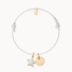 Playful and pretty, this engraved Personalized Enamel Star Bracelet is perfect for anyone wanting to add a pop of colour to their bracelet collection. Choose from a range of braid colors and enamel stars, paired with your unique, hand-engraved message.18K Champagne Gold Plated or 925 Sterling SilverMini flat disc: 04 Diameter, 0.02 ThicknessMini Star: 0.4 x 0.4Braid made of durable, colourfast polyesterFully adjustable sliding knot fasteningHand engraved in our Paris workshopSent with love in a White Charm Bracelet With Star Charm As Gift, Adjustable White Charm Bracelet With Star Charm, Adjustable White Star Charm Bracelet, White Engraved Adjustable Bracelet, White Adjustable Engraved Bracelets, Adjustable Engraved White Bracelets, White Enamel Bracelets For Gifts, White Enamel Bracelets As A Gift, Adjustable White Bracelet With Star Charm