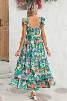 This flowy dress is perfect for warm weather or beach outings. The ruffled shoulder strap adds movement and an extra layer of visual interest. It showcases a vibrant and colorful floral pattern, creating a fresh and summery vibe The high waist design accentuates the curves and creates a feminine silhouette. Wholesale maxi dresses available for bulk orders, great for retailers Fabric Contents: Product Weight: 0.73 kgMaterial: 100%Polyester Shoulder Girdle, Boho Floral Maxi Dress, Casual Dress Pants, Denim Short Dresses, Timeless Dress, Boho Green, Feminine Silhouette, Maxi Dress Green, Tiered Maxi Dress