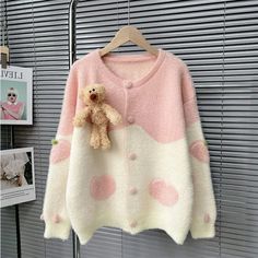 Stay cozy and cute with this adorable bear embroidered cardigan! Made with soft mink-like wool, this collarless cardigan is perfect for work or casual outings. Available in one size and in a lovely shade of pink, this sweater is a great addition to your fall/winter wardrobe! 🔥🐻❄️ #BearEmbroideredCardigan #MinkLikeWool #KnittedCardigan #FallFashion #WinterWardrobe Kawaii Crochet Cardigan, Cute Crew Neck Cardigan, Cute White Long Sleeve Cardigan, Cute White Crew Neck Cardigan, Cute Long Sleeve Knit Cardigan, Sweet Pink Cardigan For Fall, Cute Long Sleeve Cardigan, Sweet Long Sleeve Cardigan For Spring, Sweet Long Sleeve Spring Cardigan