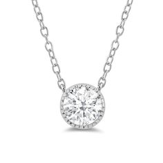 Endlessly versatile, this white gold necklace can pull together a formal, casual, and even professional look. The round pendant is topped with round diamond and surrounded by a milgrain frame. The basket setting features quadrilateral cut-outs on its sides for an edgy finish. Timeless White Diamond Necklace With Diamond Accents, Timeless White Diamond Necklace In Platinum, Timeless White Diamond Necklace With Accents, Timeless White Diamond Platinum Necklace, Classic White Diamond Necklace, Formal Round Cut Halo Diamond Necklace, Classic Diamond Solitaire Necklace With Halo Setting, Classic Diamond Necklace With Bezel Setting, Classic White Gold Solitaire Necklace With Diamond Accents