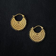 ❨ ❨ KĀLA Exclusive ❩ ❩ Afghan-inspired Hoops in 18k Gold plated on 925 Sterling Silver Lacework adornments Size: 3,2 cm x 3,5 cm 18k Gold plated is not Solid Gold and must be handled and treated with great care to preserve its quality. The durability of the plating varies depending on use, devotion to care instructions, climate, skin type and lifestyle. To maximize the durability of the plating: It is essential to remove your jewelry before sleeping, soaking in water, doing household chores, usi Small Hoop Earrings With Intricate Design For Wedding, Metal Hoop Jewelry With Intricate Design, Intricate Hoop Metal Jewelry, Small Hoop Filigree Earrings For Wedding, Small Filigree Hoop Earrings For Wedding, Small Hoop Wedding Earrings With Filigree, Ornate Handmade Hoop Earrings, Handmade Ornate Hoop Earrings, Ornate Hoop Jewelry For Pierced Ears