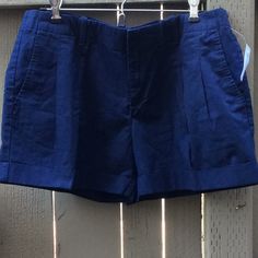 Gap Ladies Navy Shorts Nwt Pleated Front 2 Side Pockets 2 Back Pockets Zipper Front Fabric-100% Cotton Size-8 Very Cute!! Ct Item#249.0.100aiii.04232020 Gap High Waist Shorts For Spring, Gap Fitted Cotton Shorts, Fitted Cotton Shorts By Gap, Gap Mid-rise Shorts For Summer, Gap Casual Blue Shorts, Casual Blue Gap Shorts, Gap High Waist Shorts For Summer, Classic Blue Bottoms With Short Inseam, Blue Gap Shorts With Pockets