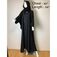 Highlights :  Plain Baggy Abaya  * Comes with Black Hijab. * The Heavy embroidery pattern on the shoulder and front  * Made of 100% pure nadha fabric. * Color: Black  Wash Care :  Dry clean or Hand Wash with Cold Water.Iron the clothes at moderate temperature. Do not use any type of bleach or stain removing chemicals. Actual color may slightly vary from the image shown. No Exchange , No return , No Cancellation  Please read carefully all the details and measurements before you buy the item. Traditional Long Niqab For Eid, Traditional Black Dabka Khimar, Black Floor-length Abaya With Dabka Work, Embroidered Long Sleeve Agbada For Eid, Festive Black Embroidered Thobe, Traditional Maxi Length Khimar With Dabka Details, Traditional Maxi Length Khimar With Dabka, Black Long Kaftan With Dabka Work, Traditional Black Abaya With Resham Embroidery