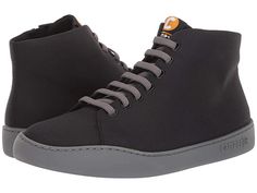 Camper Peu Touring - K300270 - Men's Shoes : Black : Bust a move in the Camper Peu Touring sneakers. Made of synthetic upper and include a lightweight EVA outsole. Elastic laces and side zip for easy wear. Recycled textile and synthetic linings. Imported. Measurements: Heel Height: 1 in Weight: 10 oz Circumference: 10 in Shaft: 4 1 2 in Platform Height: 3 4 in Product measurements were taken using size 45 (US Men's 12), width D - Medium. Please note that measurements may vary by size. Weight of Modern High-top Sports Sneakers With Laces, Casual Sneakers With Abzorb Midsole, Modern High-top Sneakers With Elastic Laces For Streetwear, Leather Sneakers With Elastic Laces, Leather Lace-up Sneakers With Elastic Laces, Sporty Black Sneakers With Recycled Rubber, Mid-top Leather Sneakers With Elastic Laces, High-top Sneakers With Elastic Laces And White Sole, Mid-top High-top Sneakers With Elastic Laces