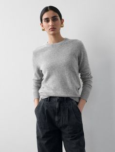 From the aptly named “Essentials” collection, this sweater is designed to be worn anytime and anyplace. It’s made from 100% traceable cashmere with finely ribbed trims and a straight fit for comfort. Keep this staple at the top of your knit drawer—it’s the kind of style you’ll be reaching for often. Details Straight fit. Long sleeve. Length in size small is 23" The model is 5'9" and is wearing a size small. 100% Cashmere Hand wash cold or dry clean. Do not twist or wring. Reshape and lay flat to Crew Neck Cashmere Sweatshirt With Ribbed Cuffs, Gray Cashmere Crew Neck Sweater, Casual Cashmere Crew Neck T-shirt, Classic Cashmere Crew Neck T-shirt, Black Cashmere Long Sleeve Sweatshirt, Cashmere, Twist, Crew Neck, Grey