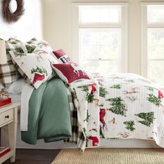 a christmas themed bed in a bedroom