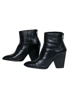 Go fierce this fall with these luxe booties from Stuart Weitzman! The classic ankle boot is upgraded with buttery soft leather and a dramatic chunky heel. Perfect for a night out during those crisp months. Style with distressed jeans and a faux fur jacket for a sleek and sultry look you can rock to the club and beyond! Size 7.5 Leather upper Back zipper closure Ankle high shaft Pointed toe Chunky heel Leather sole and footbed w/ light wear Original dustbag included Shaft 3" Heel 3.75" Chunky Heel Booties, Buy Shoes Online, Stuart Weitzman Shoes, The Club, Faux Fur Jacket, Short Boots, Chunky Heel, Fur Jacket, Chunky Heels