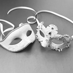 "\"It may not be your wedding day yet, or maybe it is, but show up as a couple with the all-white silver masks that would go great with any type of formal wear\"" White Masks For Mardi Gras Costume Party, White Masquerade Mask For Mardi Gras Costume Party, White Wedding Eye Mask, White Eye Mask For Wedding, White Adjustable Costume Accessories For Party, White Mardi Gras Masks And Prosthetics For Gift, White Mardi Gras Masks And Prosthetics, White Masks And Prosthetics For Mardi Gras Gift, White Adjustable Masks And Prosthetics For Masquerade