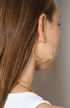 Crafted of recycled sterling silver and plated in 18-karat gold, these oversized hoops feature an organic sculptural design for a modern look. Style Name:Monica Vinader Deia Hoop Earrings. Style Number: 6203971. Available in stores. Contemporary Everyday Gold Jewelry, Polished Hoop Earrings In Recycled Gold, Recycled Gold Hoop Earrings With Polished Finish, Recycled Gold Hoop Jewelry With Polished Finish, Modern Gold Hoop Earrings In Sterling Silver, Modern Yellow Gold Hoop Earrings In Recycled Gold, Modern Gold Plated Hoop Jewelry, Contemporary Small Hoop Jewelry For Everyday, Everyday Contemporary Small Hoop Jewelry