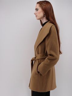 Rendered in Baby Alpaca and Merino Wool, the coat is sumptuously supple and fits to flatter. Designed by one of Peru's finest coat makers, the coat drapes wonderfully for a perfectly feminine fit. It's mid-length enhances its versatility so it can easily transition from a day-to-night look. STYLING Casual Styling Wear over your favorite jeans and tee for everyday elegance with minimal effort and fuss. Office Wear Power through a presentation or meeting with this rich wrap coat. Travels beautiful Black Camel, Wrap Coat, Women Shawl, Baby Alpaca, Night Looks, Shawl Collar, Office Wear, Above The Knee, Favorite Jeans