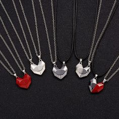 Magnetic Couples Necklace 2pcs/set Heart pendant Unisex necklace set Gifts for couples This is a magnetic pair of heart-shaped jewelry that you and your significant other can wear. The halves of the hearts are magnetized to each other when they are close. The pendant is available in several color combinations: black only, silver only, red only, and a combination of black and silver and red and black. We value all our customers and we make every effort to send a fantastic quality product and proc Black Alloy Charm Necklaces For Gifts, Black Alloy Charm Necklace For Gift, Valentine's Day Alloy Heart Pendant Necklace, Valentine's Day Jewelry With Heart Charm, Couples' Heart Charm Jewelry For Valentine's Day, Valentine's Day Couples Jewelry With Heart Charm, Couples Heart Necklace For Gift, Couples Heart-shaped Necklace For Gift, Couples' Valentine's Day Jewelry With Heart Charm