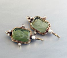 ✽ D E T A I L S Gemstone} - Quartz {Material} - Brass {Gemstone Size} - 12X18 mm {Earring Height Including Hoop} - 4 cm {Earring Width} - 2.3 cm {Finish} - Smooth and high polished with brilliant shine. {Note} -The earrings are made to order, production day is about 3-5 working days. The one you receive may be slight different from the one in the picture due to handmade nature, but it will be almost same as in the above picture. These pieces are handcrafted from start to finish and have an imper Vintage Green Jeweled Earrings, Vintage Intaglio Pendant Jewelry, Vintage Green Brass Earrings, Intaglio Jewelry, Art Nouveau Yellow Gold Intaglio Jewelry, Vintage Hallmarked Green Earrings, Jewelry Quotes, Antique Diamond Rings, Gold Jewelry Simple