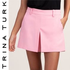 New With Tags Trina Turk Solar Shorts In Pink Size 6 - Refer To My Photos For Measurements An Overall Clean And Sleek Look. The High-Rise Short Features A Relaxed Hip And Thigh And Has A Slightly Flared Silhouette To This Modern Skort, A Shorts And Skirt Combo. Wear As A Weekend-Casual Look, Paired With A Tee, Or Dress It Up With A Silk Blouse And Heels For A Night Out. Belt Loop Waistband Concealed Side Zip Closure Inverted Front Pleat Side Slash Pockets Lined Inseam: 4", True To Size 100% Poly Chic Above Knee Spring Bottoms, Chic Workwear Skort With Short Leg, Summer Workwear Mini Skirt With Short Inseam, Chic Mini Shorts With Pockets, Summer Workwear Skort With Short Inseam, Summer Workwear Skort With Short Leg, Summer Workwear Skort, Short Length, Chic Spring Shorts, Summer Workwear Short Skort