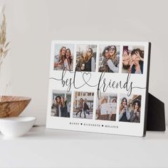 a white photo frame with the words best friends on it next to a bowl and plant