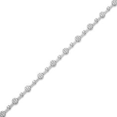 Add the perfect touch of shimmer with this dainty diamond station bracelet. 10K white gold Circular diamond composites alternate with single diamond stations along the design 1/4 ct. t.w. of diamonds 7 inches; box clasp Station Bracelet, Box Clasp, Diamond Jewelry, Diamonds, White Gold, Bracelet, Gold, White, Quick Saves