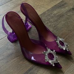 An Italian-Made Pump For The Most Glam Of Cinderellas Gets Its Ethereal Look From A Clear Upper Crowned With An Opulent Jeweled Ring. Amina Muaddi's Kick-Flare Heel Is The Signature Finish. Elegant Purple Slingback Heels, Elegant Purple Slingback Pumps, Purple Slingback Pumps For Party, Purple Slingback Heels For Formal Occasions, Amina Muaddi Begum, Muaddi Shoes, Amina Muaddi Heels, Amina Muaddi Shoes, Purple High Heels