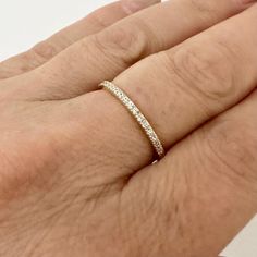 14k Gold Tiny half eternity tennis ring CZ delicate ring woman Yellow Gold dainty minimalist ring Everyday wear jewelry gift girlfriend her Material: 14k Gold, cubic zirconia  Size: 8 US Cute 14k Gold tiny half eternity tennis ring for woman. This CZ delicate ring is perfect for everyday wear. If you like minimalist jewelry, it's perfect item for it! Minimalist 14k Gold Eternity Band With Vvs Clarity, Minimalist Diamond Eternity Band For Everyday, Diamond Minimalist Everyday Eternity Band, Minimalist Everyday Diamond Eternity Band, Dainty Diamond Eternity Band For Everyday, Everyday Dainty Diamond Eternity Band, Dainty Everyday Diamond Eternity Band, Minimalist Diamond Eternity Band, Minimalist Diamond Stackable Rings With Half Eternity