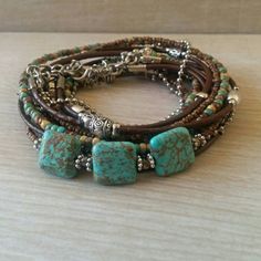 Boho Multi Strand Leather Wrap Bracelet Turquoise by DesignsbyNoa Turquoise Hand-wrapped Hippie Beaded Bracelets, Adjustable Turquoise Bohemian Wrap Bracelet, Adjustable Bohemian Turquoise Wrap Bracelet, Hippie Green Bracelets For Beach, Hippie Green Bracelet For Beach, Adjustable Bohemian Wrap Bracelet, Green Hippie Beach Bracelets, Adjustable Turquoise Wrap Bracelet For Festival, Turquoise Hand Wrapped Bracelets For Festivals