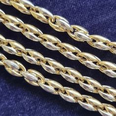 A fine quality necklace from Italian luxury designer Chimento, the fancy links made in 18ct yellow and white gold, fastened by a lobster claw clasp, with Chimento's stamp. Circa 2000's. With Italian (Vicenza) marks for 18ct gold. The chain measures approximately 500mm / 20 inches (L) x 4.9mm (W). The approximate weight is 25.9 grams. Please note that the antique box pictured is for display purposes only. Thank you. CONDITION: In very good vintage condition, with minimal surface wear commensurate with age. The clasp functions perfectly. LAYAWAY: We happily offer layaway/deposits on the majority of our items. Please send us a message if you would like to arrange a layaway. Layaways are not available on sale items. SHIPPING: All items are packed in a gift box and are sent securely within 1-3 Classic Evening Chain Necklace, Formal Wheat Chain Link Necklace, Luxury Yellow Gold Chain Necklace With Lobster Clasp, Elegant Formal Chain Necklace With Lobster Clasp, Elegant Yellow Gold Wheat Chain Necklace, Elegant Wheat Chain Necklace For Anniversary, Hallmarked Yellow Gold Link Chain Necklace, Luxury Wheat Chain Necklace With Oval Links, Luxury Chain Necklace With Lobster Clasp For Formal Occasions