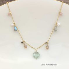 Classic and lovely on her own, our versatile Zina staple is also striking layered over or under a variety of other styles to create the perfect layered look. Length- 16″-18″ (available longer or shorter upon request) Gemstone Size- 10MM Looking for layering options? Our layering recommendations: Marquee Katie Colorful Gem Necklace Erica Layering Necklace Elegant Adjustable Necklace With Gemstone Accents, Double Strand Gemstone Necklace For Layering, Dainty Necklaces With Natural Stones For Layering, Elegant Everyday Amethyst Necklace, Gemstone Double Strand Necklace, Classic Tanzanite Gemstone Necklaces, Elegant Tanzanite Gemstone Bead Necklace, Adjustable 14k Gold-filled Gemstone Necklace, Formal Multi-stone Amethyst Necklaces