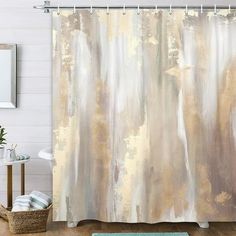 a bathroom with a shower curtain and rug