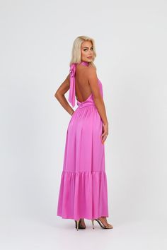 Pink Long Dress With Tie Back, Summer Wedding Evening Dress With Tie Back, Pink Fitted Halter Dress For Wedding, Pink Tie Back Backless Dress, Pink Tie-back Backless Dress, Pink Satin Halter Neck Maxi Dress, Maxi Length Tie Back Dress For Wedding Guest, Backless Satin Dress For Wedding Guest, Pink Flowy Backless Dress