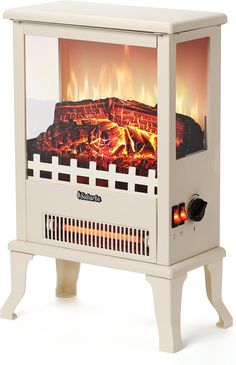 an electric stove with flames on the front and side panels, in white wood frame