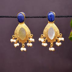 Fancy Party Wear Traditional Jhumki Earrings. Perfect with ethnic & traditional wear. Perfect gift for any occasion for yourself and your dear ones. These Earrings can be worn with all kind of Outfits. It is advisable to store jewellery in a zip lock pouch (air tight pouch), keep away from water perfume and other chemicals and clean it with dry and soft cloth. Temple Jewelry Danglers For Diwali Celebration, Festive Temple Jewelry Danglers Gift, Diwali Temple Jewelry Danglers For Celebration, Temple Jewelry Earrings For Eid Celebrations, Festive Temple Jewelry Pearl Earrings With Latkans, Temple Jewelry Bridal Earrings With Cutdana, Temple Jewelry Bridal Earrings With Cutdana As Gift, Festive Temple Jewelry Dangle Danglers, Festive Cutdana Pearl Earrings