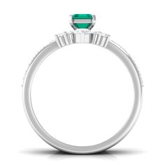 Product Details Bring an elegant touch to her overall look on a special day by presenting our Engagement Ring Set. Embellished with Octagon shape Emerald secured by Prong Setting while dainty Round Diamond studded on enhancer ring. The stunning Emerald Ring Set makes an excellent type of ring that will elevate any outfit with ease. Make her feel out of this world with this Trio Ring Set. Product Information SKU SHP-RINGS032219007 Weight 4.00 gm (Approximate) EMERALD INFORMATION No.of Stones 1 Pieces Total Weight 0.66 Carat (Approximate) Dimension(approx) Emerald Cut-4X6 mm-1 Pcs Color Green Cut Brilliant Shape Emerald Cut Setting Type Prong-Setting Quality Grade AAA DIAMOND INFORMATION No.of Stones 28 Pieces Total Weight 0.68 Carat (Approximate) Dimension(approx) Round-1.20X1.20 mm-23 PcsR Trio Ring, Ring Sizer, 18k Yellow Gold Ring, Types Of Rings, Emerald Ring, Engagement Ring Settings, Diamond Studs, Yellow Gold Rings, Prong Setting