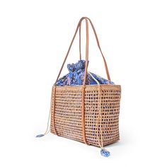 This versatile mesh tote bag is a must-have for any Summer occasion. With its stylish design and convenient size, it's the perfect companion for your resort, beach, or cruise vacation. Its neutral honey color makes it easy to coordinate with any outfit. (PRODUCT INFO): Features drawstring closure Size: 10" height x 14" width x 5" depth inches Fully lined interior with batik print 100% cotton Material: Ata/rattan (SHIPPING INFO): All our items are made-to-order, therefore please allow 3-5 busines Travel Beach Bag With Removable Pouch In Rectangular Shape, Summer Crochet Bag With Double Handle And Removable Pouch, Daily Use Woven Bucket Bag For Vacation, Eco-friendly Beach Bag With Removable Pouch, Eco-friendly Beach Bag With Removable Pouch For Travel, Beachy Bucket Bag With Braided Handles For Daily Use, Natural Bucket Bag With Removable Pouch For Beach, Beach Bucket Bag With Removable Pouch In Natural Color, Natural Beach Bag With Removable Pouch And Double Handle