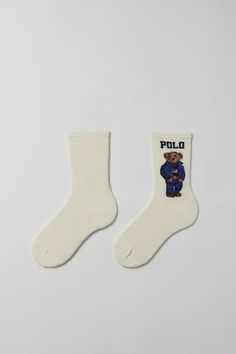 So soft socks from Polo Ralph Lauren with their signature bear design. Cut in an essential crew length. Content + Care 60% Cotton, 21% nylon, 17% polyester, 2% spandex Machine wash Imported Size + Fit Crew length | Polo Ralph Lauren Americana Sport Bear Crew Sock in Ivory, Women's at Urban Outfitters Crew Socks Aesthetic, Polo Ralph Lauren Socks, Ralph Lauren Bear Socks, Cute Crew Socks, Gifts Under $50, Polo Bear Socks, Cute Socks Aesthetic, Stocking Stuffers Women, Ralph Lauren Americana