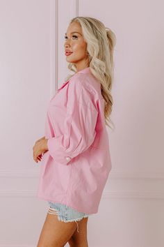 - From office hours to after hours, this chic top will keep you looking stylish! - Unlined material - A collared v-cut neckline featuring a faux pearl button for additional coverage and a pleated detail - ¾ length sleeves with button closure cuffs - A relaxed silhouette that ends in a subtly rounded hemline Pink Collared Top With Button Closure, Pink 3/4 Sleeve Top For Work, Feminine Pink Collared Top, Feminine Workwear Blouse With 3/4 Sleeves, Feminine Blouse With 3/4 Sleeve For Workwear, Pink V-neck Blouse For Work, Elegant Pink Blouse With 3/4 Sleeves, Feminine Pink Blouse For Work, Pink Collared Top For Office