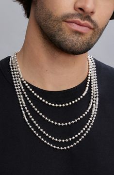 Signature Caviar beading and fluted accents lend additional intrigue to this handsome sterling silver chain necklace. Sterling silver Imported Classic Sterling Silver Jewelry With Beaded Chain, Classic Silver Jewelry With Beaded Chain, Silver Long Necklace With Polished Beads, Formal Silver Beaded Necklace, Luxury Sterling Silver Necklace With Polished Beads, Sterling Silver Jewelry With Round Beads Chain, Luxury Silver Necklaces With Round Beads, Formal Silver Jewelry With Beaded Chain, Luxury Silver Round Beaded Necklace