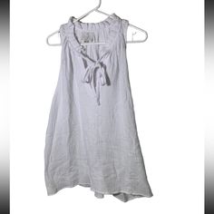 Top Joie White Sleeveless V Neck Xl Brand New Without Tags Spring Tie Neck Top For Beach, Spring Beach Tie Neck Tops, Summer Beach Blouse With Tie Neck, Casual Sleeveless Beach Vest, Summer V-neck Tank Top For Daywear, Sleeveless Cotton Beach Vest, Sleeveless Cotton Vest For Beach, Beach Sleeveless Cotton Vest, Chic Beach Top With Tie Neck