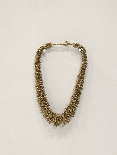 "This is a Beautiful Vintage Indonesian Bronze and Beige Beaded Loop Adjustable Necklace. This necklace has a beaded ball and ring enclosure and can be adjusted. A great necklace for all occasions. Length 18.5\" - 22\" Long Adjustable Width 35mm\" Wide Bottom 12mm - 18mm Wide Sides AT BACARA WE STAND BEHIND ALL OF OUR MERCHANDISE. WE CAN PROVIDE REFERENCES FOR ALL ARTIFACTS THAT WE SELL, AS WELL AS DOCUMENTATION TOWARD THEIR AUTHENTICITY. FULL MONEY BACK GUARANTEE WILL BE PROVIDED FOR DISSATISFI Loop Necklace, Beaded Ball, Overland Park, Adjustable Necklace, White Heart, Delicate Bracelet, Beaded Necklaces, Artifacts, Necklace Etsy