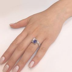 This Gemini twin inspired ring is crowned with a Ceylon blue sapphire 2.17 ct in emerald cut. It is mirrored by a white diamond 1.06 ct also in emerald cut, in G-H Color Clarity VS. Both pair of stones are GIA certified. Smaller round natural white diamonds 0.65 ct as accents. Platinum 950 metal. Length: 1.1 cm Width: 1.0 cm Weight: 7.1 g [shortcode] [video] [/video] [/shortcode] White Gold Hoop Earrings, Platinum Bracelet, Ceylon Blue Sapphire, White Gold Hoops, Platinum Earrings, Ceylon Sapphire, Platinum Diamond Rings, 18k Gold Jewelry, Platinum Ring