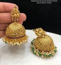 Jadau peacock Kemp Ruby Stones Jhumka Earrings/Light weight /Antique Gold Finish/Indian Jewelry/desi jewelry / indian jhumkas Size : Approx 3 inches  Best use for gifting purposes. It can be wore on any occasion and with any outfit. You can gift this to your sister as Diwali gift  OCCASION: PARTY WEAR, WEDDING, MARRIAGES, CASUAL, DAILY WEAR These Earrings set have an excellent finish Ideal Gift Idea: Perfect beautiful & memorable gift for you and your loving wife, girlfriend, sister, aunt, daughter, and mom/mother/mummy. CARE Avoid Contact With Chemicals Such As Perfumes Or Any Sprays. Avoid Contact With Water. Use Butter Paper Or Cotton Cloth To Store Your Jewellery For A Longer Product Life. OFFER!! OFFER !!  BUY $35 Items from my shop and get Guaranteed Free Shipping!! Gold Peacock Design Jhumkas For Navratri, Gold Jhumkas With Peacock Design For Navratri, Gold Peacock Design Jhumkas For Festive Season, Navratri Gold Jhumkas With Peacock Design, Festive Gold Jhumkas With Peacock Design, Gold Jhumkas With Peacock Design For Celebrations, Gold Chandbali Jhumkas With Peacock Design, Gold Bollywood Jhumkas With Peacock Design, Gold Kundan Jhumkas With Peacock Design