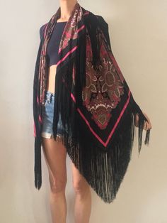 Gorgeous 1970s silk fringe maxi scarf. Perfect boho style worn with whatever you like! Shake your fringe!Add a pop of color pairing it with a black jacket. Wonderful soft silk with a dramatic black and hot pink floral paisley pattern. Hot pink, green, grey, white and black - super ornate and baroque paisley. Black rayon fringe border. Signature on the scarf is illegible. 100% silk. Please dry clean only. Very good vintage condition with no fabric or sewing flaws. Measurements116cm by 116cm/ 45 b Bohemian Shawl With Tassels For Spring, Bohemian Spring Shawl With Tassels, Vintage Scarves For Summer Festivals, One Size Tassel Shawl For Festivals, Festival Shawl With Tassels, Bohemian Scarves With Tassels For Spring, Folk Style Shawl For Spring Festival, Bohemian Fringe Shawl For Spring, Vintage Summer Scarves For Festivals