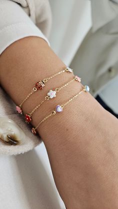 Spoil your little one with an adorable style statement that's also built to last! This 14K Gold Colorful Heart Baby Bracelet is perfect for everyday wear – or any occasion where the "oohs" and "aahs" are a must. With four enamel hearts and a gold finish, this bracelet looks as good as gold (get it?)! The length of the baby bracelet is 6'' inches with jump ring at 5 1/2''. Cute Rose Gold Bracelet Jewelry, Playful Everyday Bracelet Jewelry, Sweet White Bracelet Jewelry, Cute Adjustable Jewelry With Heart Charm, Playful Jewelry With Adjustable Chain For Gifts, Playful Heart Beads Jewelry For Everyday, Adjustable Sweet Jewelry, Cute Rose Gold Bracelets For Valentine's Day, Playful White Jewelry For Valentine's Day