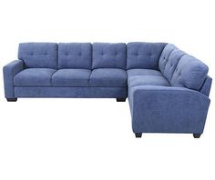 a blue sectional sofa with chaise lounger and ottoman in the back, on an isolated white background