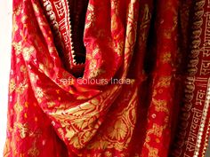 Express shipping! A very beautiful red colour Sada Saubhagyawati Bhava rich Banarsi Ghatchola silk golden zari woven dupatta. This dupatta also has Bandhani hand tie dye design. It can be used for wedding dupatta, Odhani, with festival outfits, Lehenga dupatta, it is a multipurpose dupatta which goes with most of the things and occassions. It can also be used to gift to someone. This is a zari woven dupatta with full length there is no print on it. Dimension: Length: 2.5 meter Width: 1.04 meter Red Raw Silk Anarkali Set With Dupatta, Festive Red Anarkali Set With Dupatta, Red Sharara With Dupatta In Chanderi, Red Chanderi Sharara With Dupatta, Red Raw Silk Traditional Wear With Sheer Dupatta, Red Art Silk Anarkali Set With Gota Work, Red Unstitched Anarkali Set With Dupatta, Unstitched Red Sharara With Dupatta, Red Raw Silk Dupatta With Gota Work