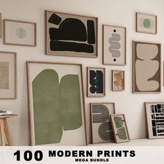 there are many modern prints on the wall