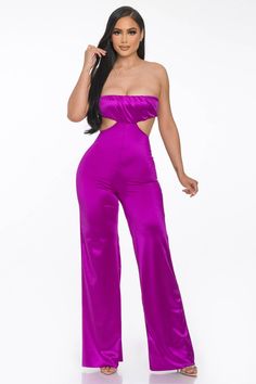 Be a sultry stunner in this Strapless Tube Cut Out Jumpsuit! From a sexy night on the town to a chill brunch, you can rock this versatile look in a variety of colors and patterns. The slim fit keeps you looking sleek and the side cut outs add a flirty touch. With stretchy fabric made for flexin', you'll be feelin' fierce all day long. Solid Satin Jumpsuits And Rompers For Night Out, Fitted Satin Strapless Jumpsuit For Night Out, Fitted Satin Jumpsuit And Romper For Party, Strapless Jumpsuit For Evening, Pink Strapless Jumpsuits And Rompers For Party, Evening Strapless Satin Jumpsuit, Flirty Jumpsuits And Rompers For Date Night, Red Strapless Jumpsuit For Parties, Red Strapless Jumpsuits And Rompers For Party