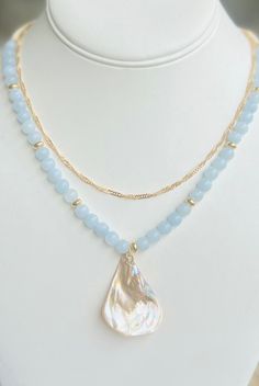 Get summer ready with this beautiful boho necklace! Made with Genuine Aquamarine gemstones in beautiful blue hues and accented with small shell beads, gold beads, and gorgeous Abalone Shell Pendant. Also comes with a beautiful gold layering necklace for an extra styled look as a gift. This piece is customizable and beautifully made, a perfect gift Mother's Day, birthdays, showers, Anniversary gifts, best friend gifts and anytime wear.  Please choose your custom size at check out!  Each piece comes in an elegant drawstring gift bag as shown and a free gold necklace!  Please contact me with any questions.  Shipping Every item is carefully wrapped for shipment and includes a small keepsake adjustable woven bag. Shipping is fast and sent out the next day via usps first class mail. Message me w Venus In Sagittarius, Get Summer Ready, Necklace Shell, Gifts Best Friend, Necklace Womens, Aquamarine Necklace, Stone Beaded Necklace, Aquamarine Jewelry, Gold Necklace Layered